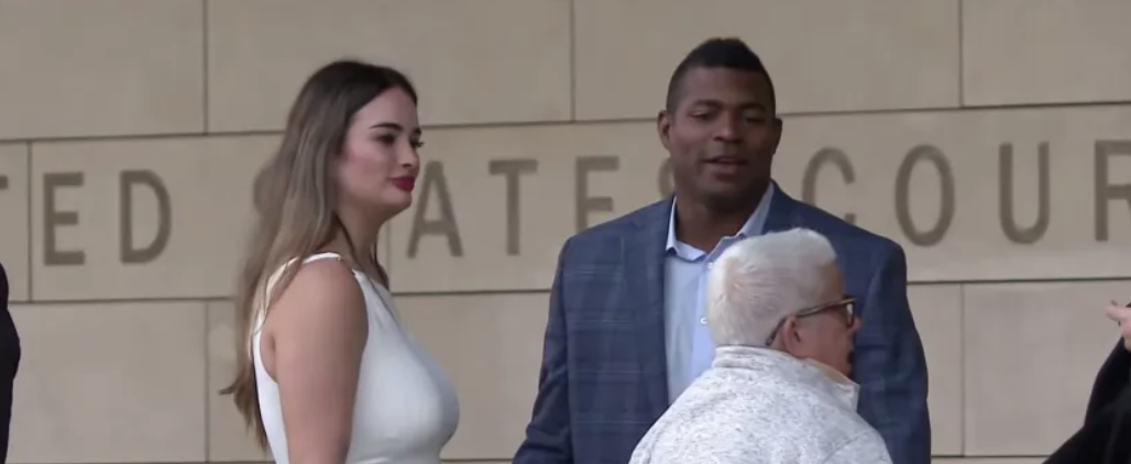 Yasiel Puig with woman outside courtroom 