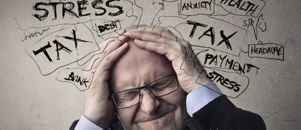Man stressed out over taxes