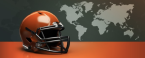 American football helmet on an orange surface with a world map in the background, symbolizing the international expansion of the NFL.